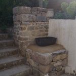 Réhausse mur existant et création d'un barbecue en pierres sèches