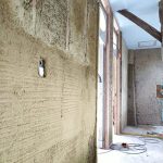 Cloison en terre paille banché et corps d'enduit terre