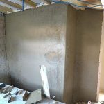 Corps d'enduit terre sur cloison